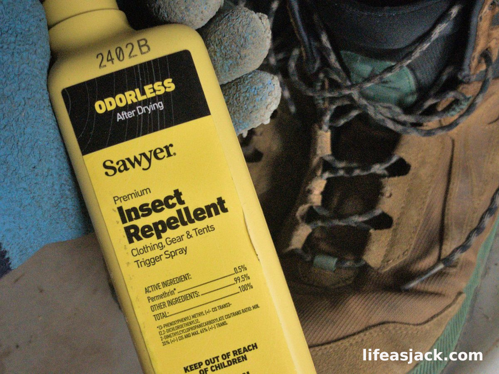 A gloved hand holding a yellow spray bottle of insect repellent